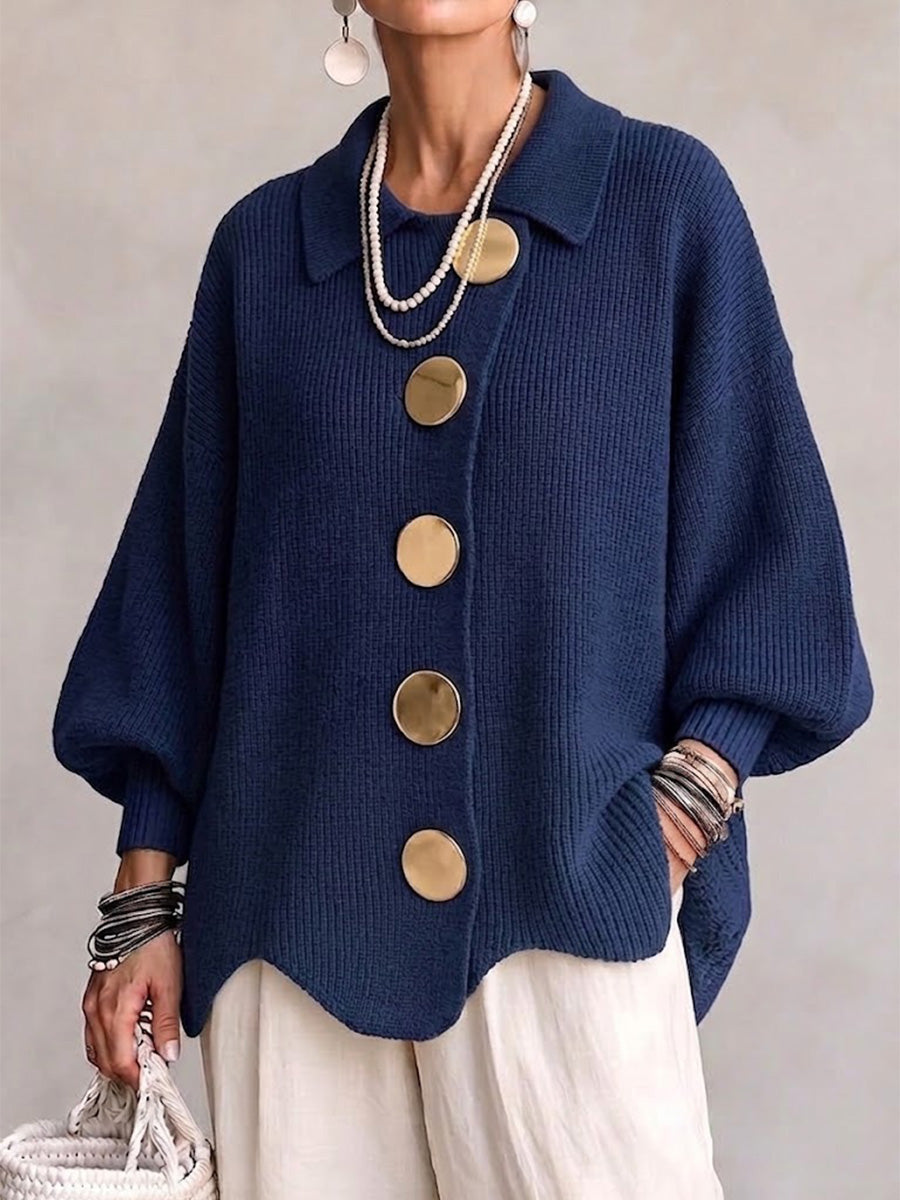Oversized blue collared button cardigan with long balloon sleeves and large round buttons