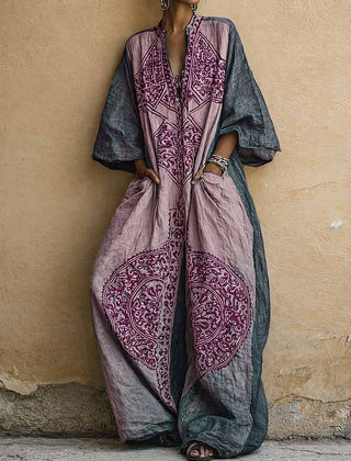 Printed two-piece set: V-neck top and wide-leg pants; indigo with purple-pink motifs