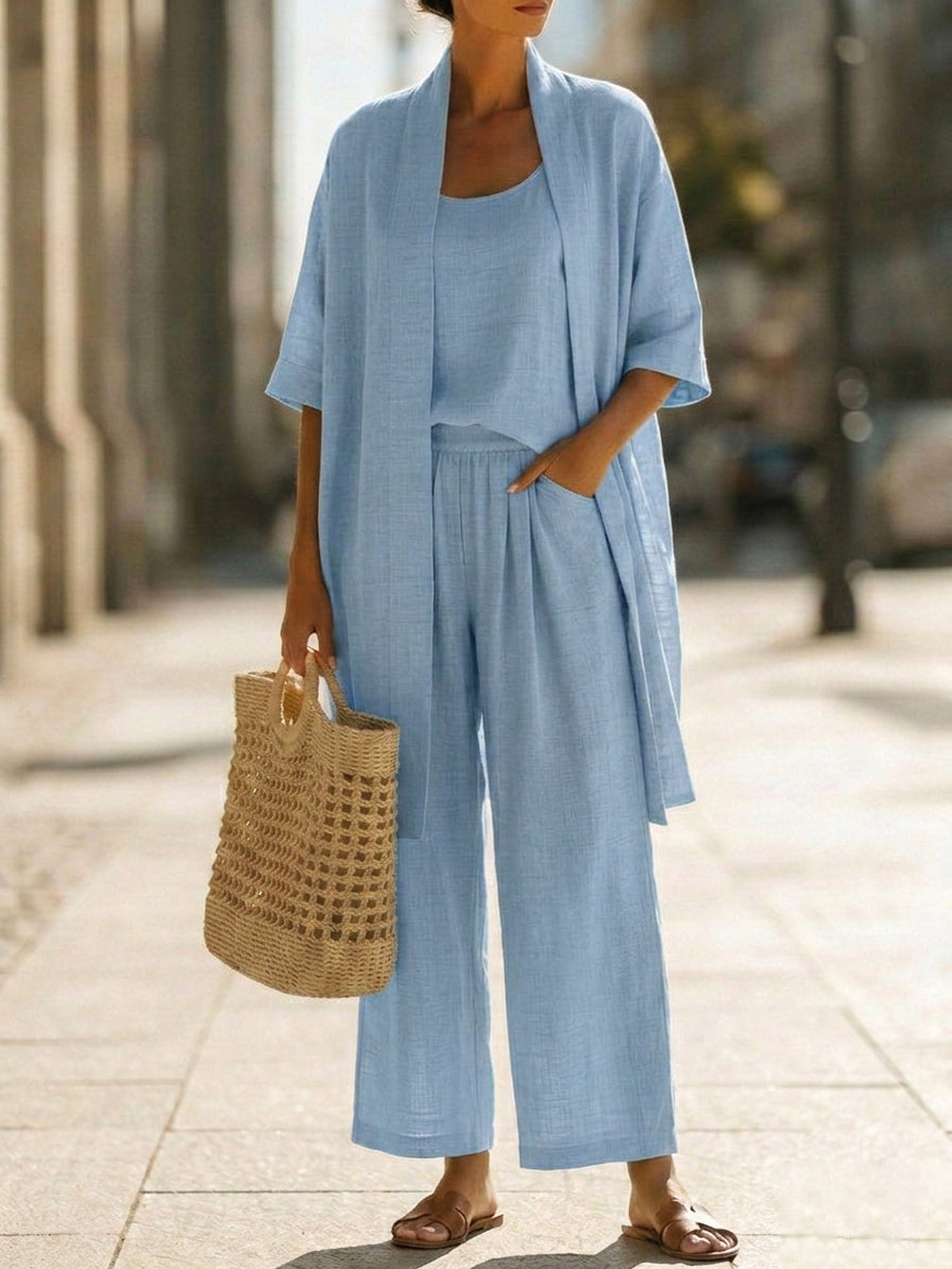 Light blue 3-piece set with scoop tank, wide-leg pants, and loose kimono layer