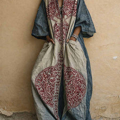 Printed two-piece set: V-neck top and wide-leg pants; indigo with burgundy/cream motifs
