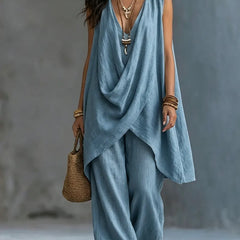 Blue sleeveless draped wrap top and loose linen-cotton pants set