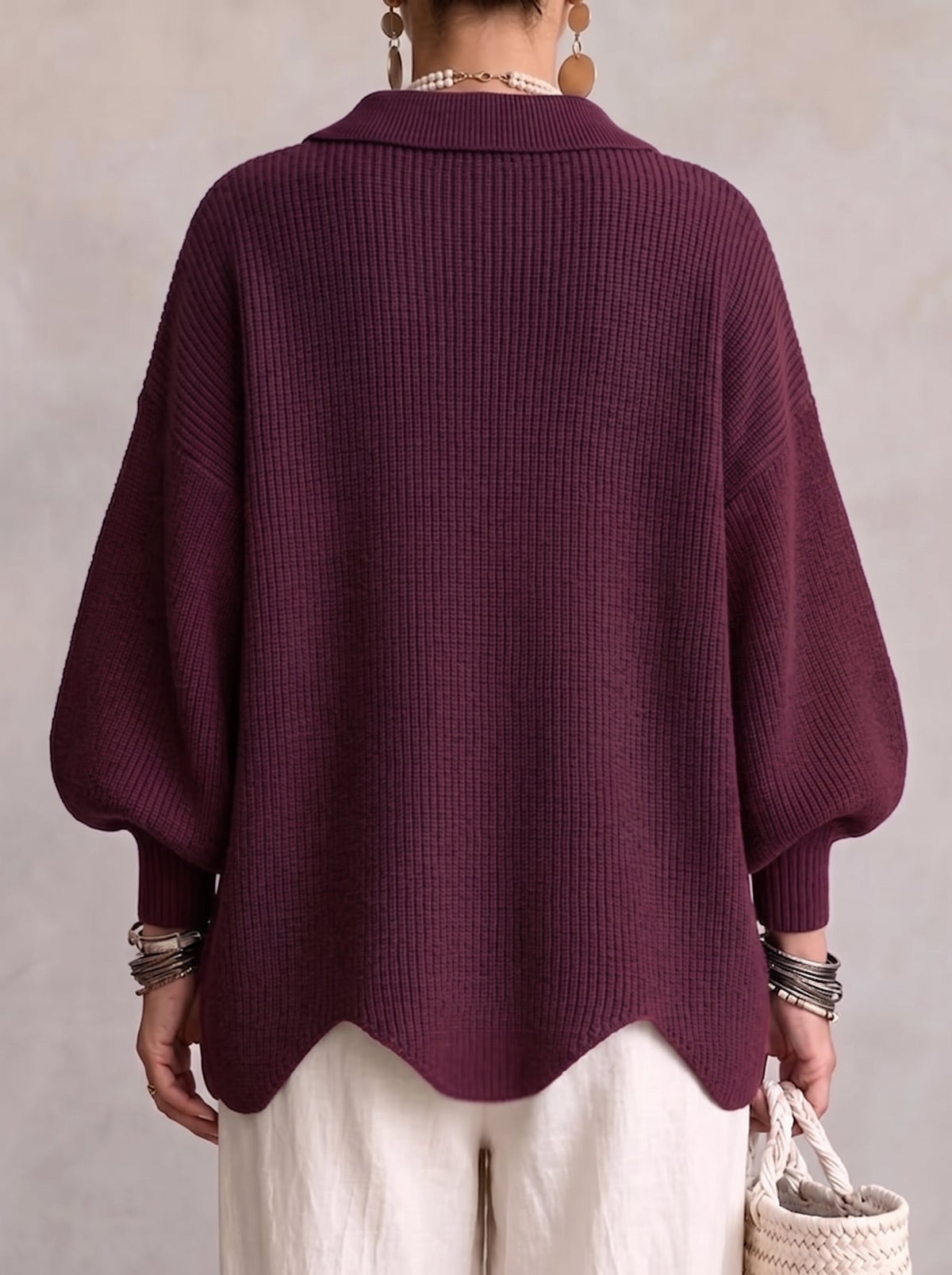 Back view of oversized wine collared button cardigan with ribbed knit yoke and balloon sleeves