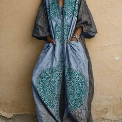 Printed two-piece set: V-neck top and wide-leg pants; indigo with teal motifs on cream