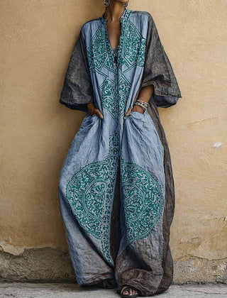 Printed two-piece set: V-neck top and wide-leg pants; indigo with teal motifs on cream