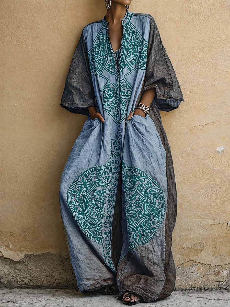 Printed two-piece set: V-neck top and wide-leg pants; indigo with teal motifs on cream