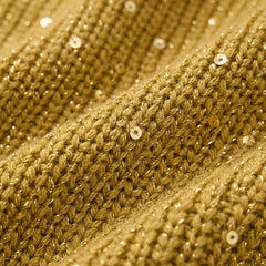 Gold knit cardigan fabric close-up with subtle sequins and small button-like details