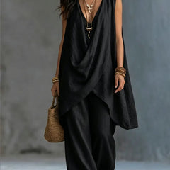Black sleeveless draped wrap top and loose linen-cotton pants set