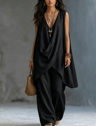 Black sleeveless draped wrap top and loose linen-cotton pants set