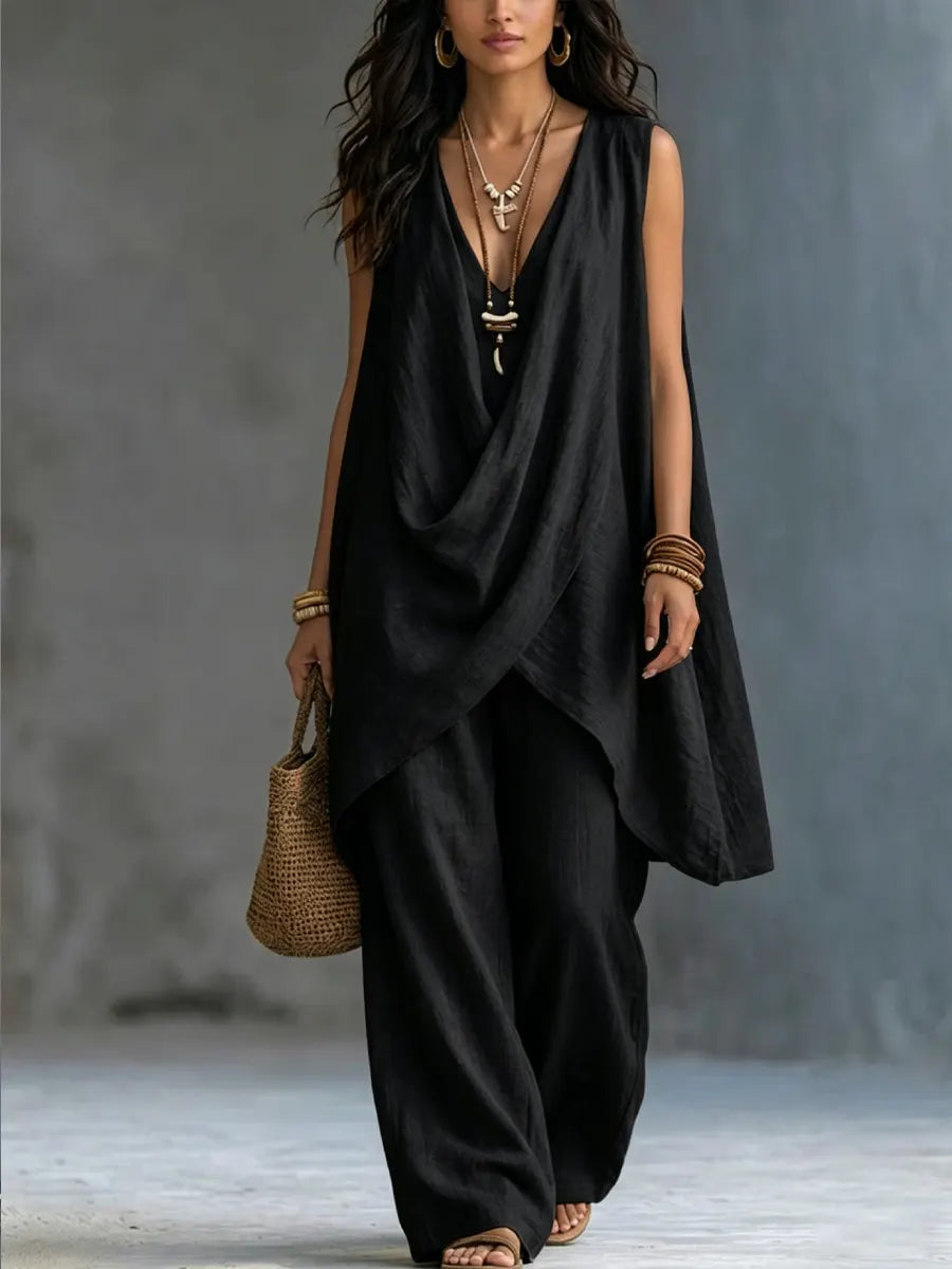 Black sleeveless draped wrap top and loose linen-cotton pants set