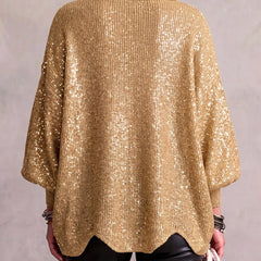 Back view of oversized gold sequin collared button cardigan with 3/4 balloon sleeves