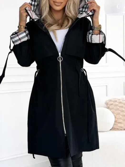 Women's black hooded waterproof jacket with front zipper and adjustable cuffs