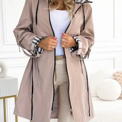 Women's taupe hooded parka with plaid hood lining and long drawcord ties