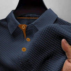 Dark blue textured polo shirt with brown-button placket and short sleeves