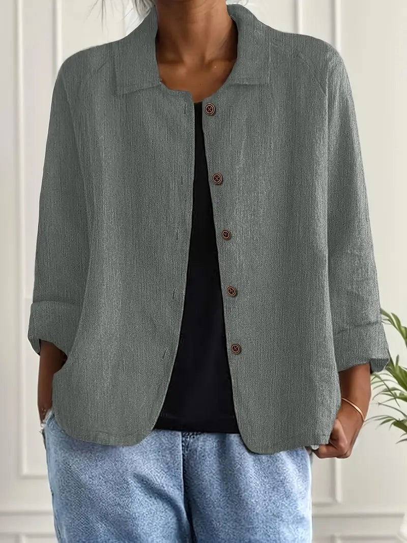 Soft grey-green button-front blouse with collared neckline and long sleeves