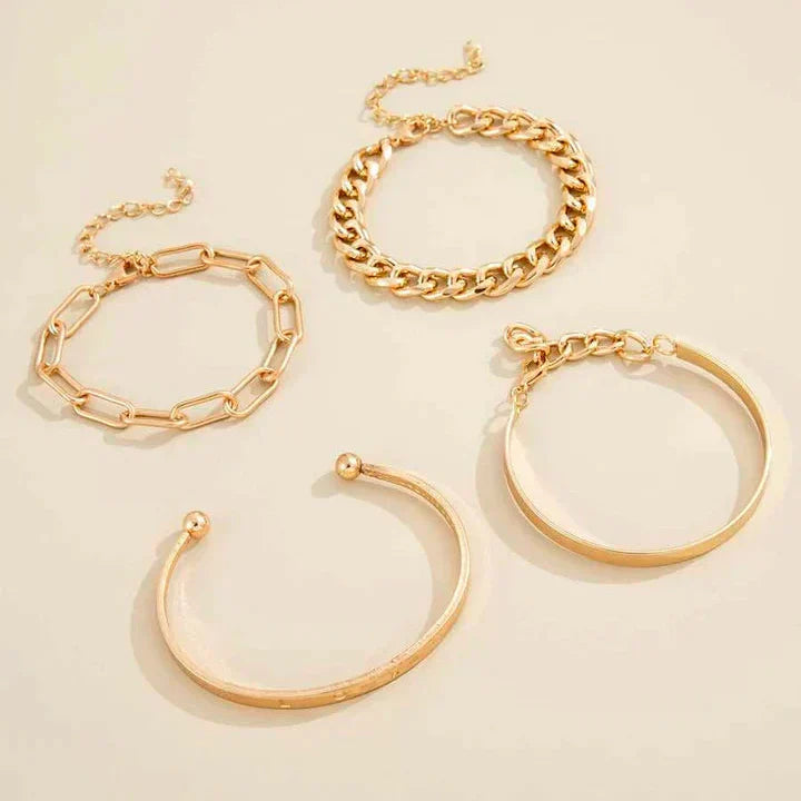 Gold-tone bracelet set with link chain and curved hoop bangles, open cuffs