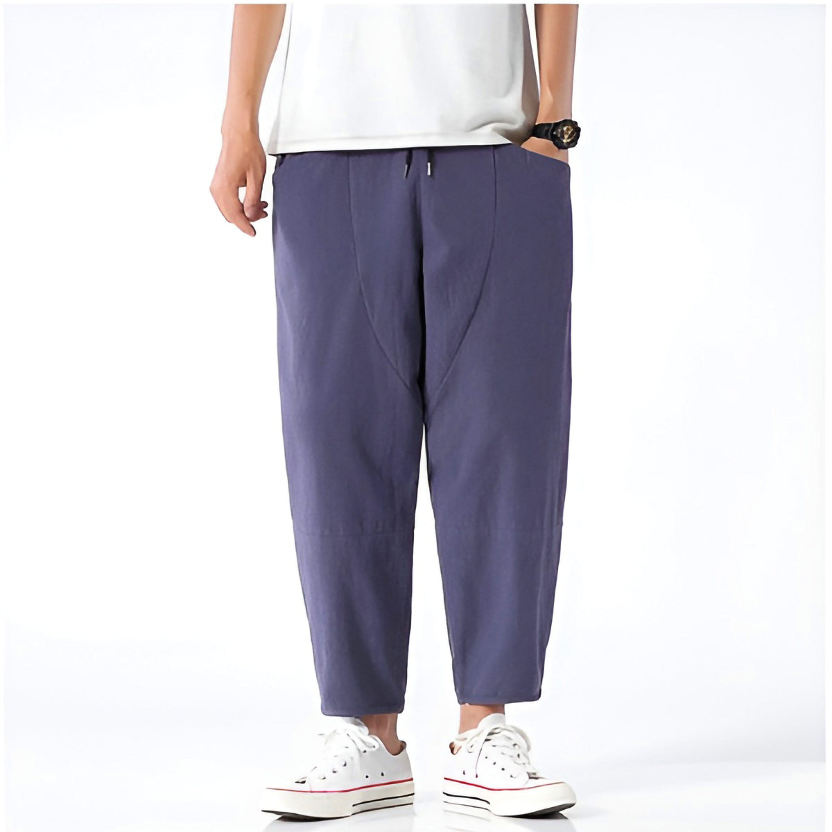 Indigo cropped cotton pants, front view with drawstring and zip pocket details