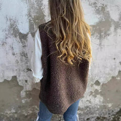 Etta women’s dark brown short warm vest, open front with longline back.