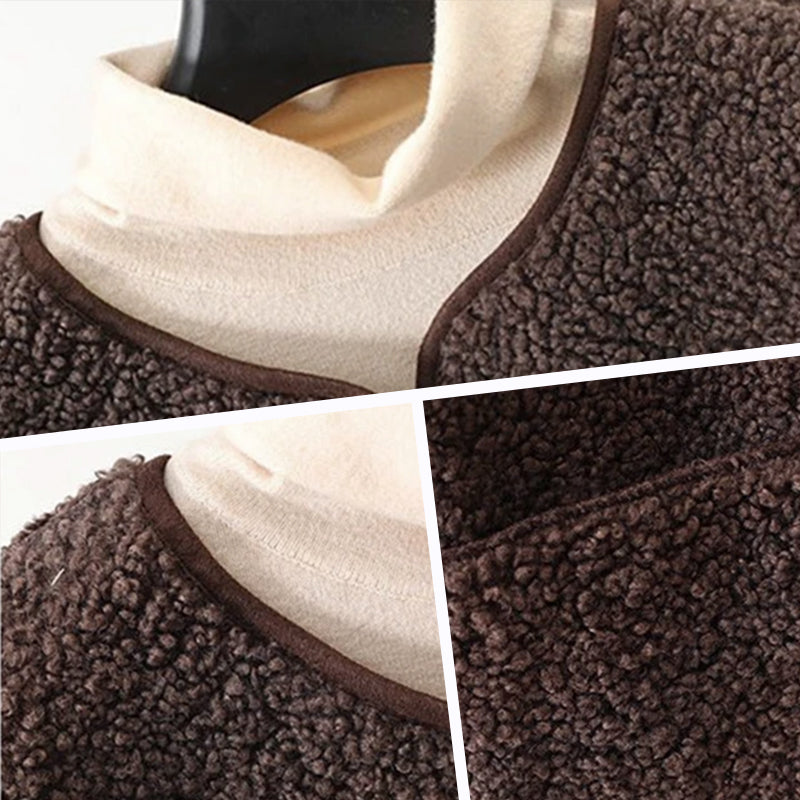 Brown sherpa vest close-up showing neckline trim and button placket texture.