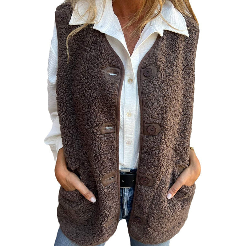 Etta women’s short warm vest in dark brown, button-front and layered flap pockets.
