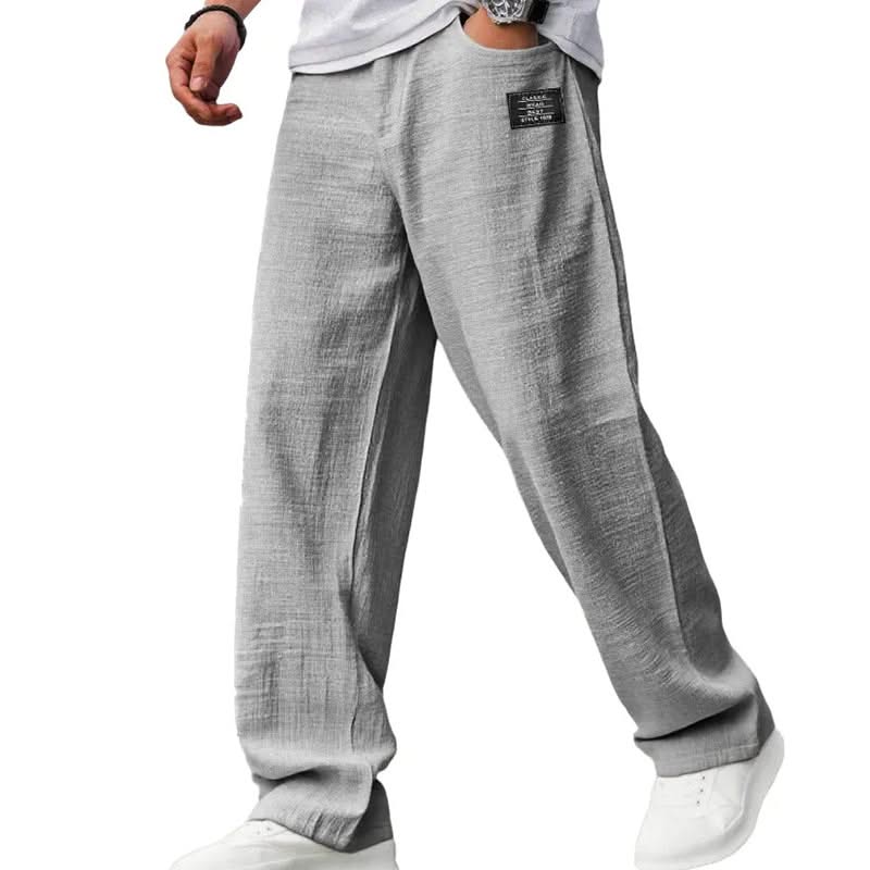 Grey casual fit pants with wide straight legs and elasticized waistband