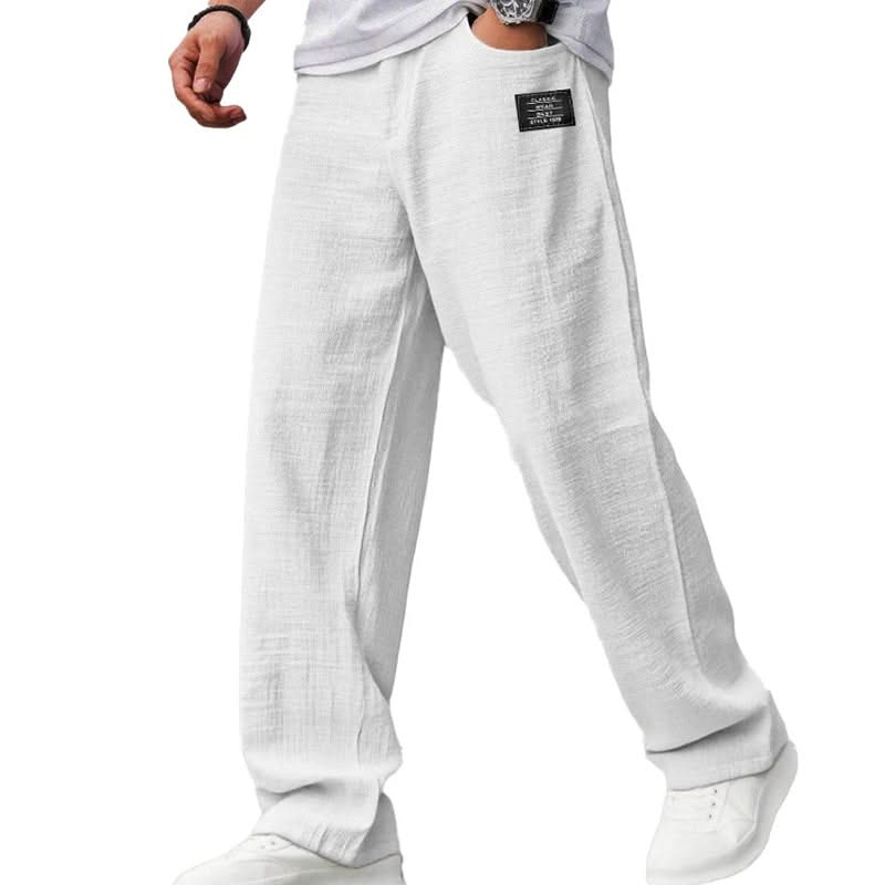White casual fit pants with wide straight legs and elasticized waistband