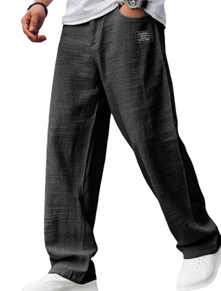Black casual fit pants with wide straight legs and elasticized waistband