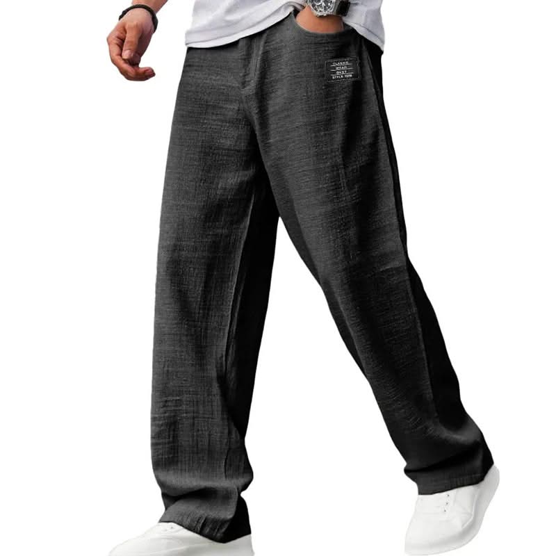 Black casual fit pants with wide straight legs and elasticized waistband