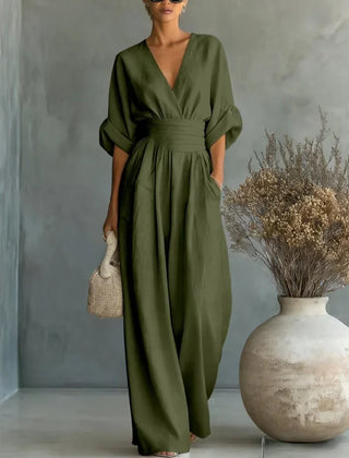 Olive green V-neck high-waisted jumpsuit with gathered waist and wide-leg legs