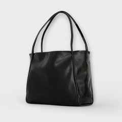 Black leather-look tote bag with wide handles and smooth front panel